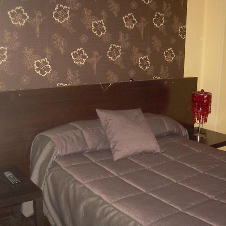 Pension El Parque Авілес Номер фото